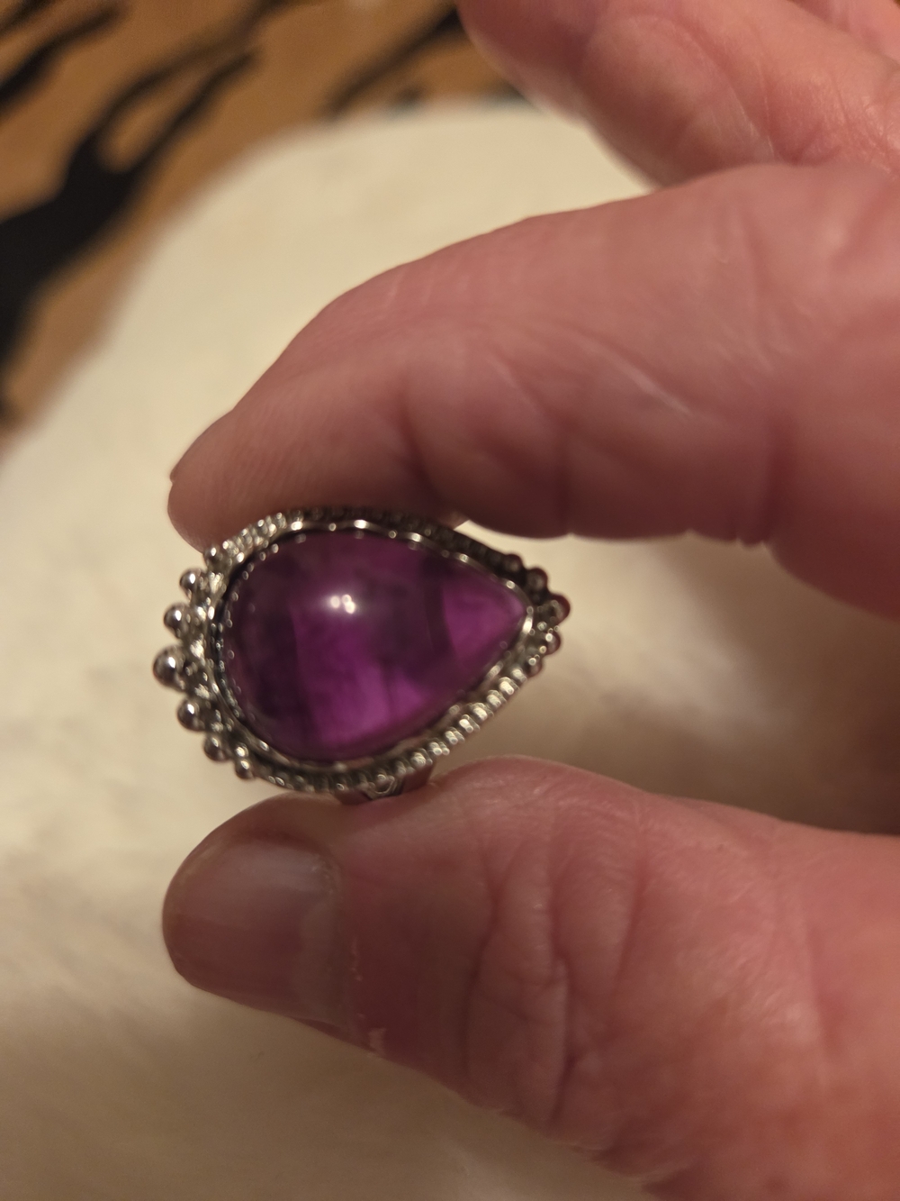 Teardrop Amethyst Statement Ring Styled in an Intricate Beaded Bezel Setting